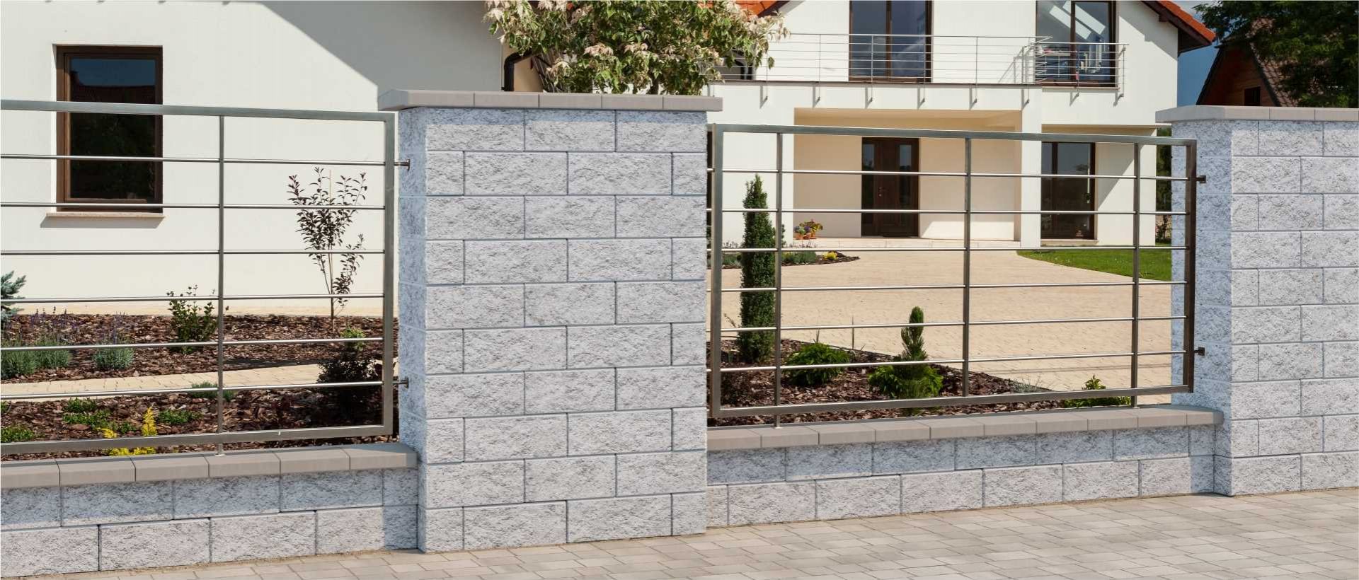 White split face hollow wall and post block and White double-slope cap
